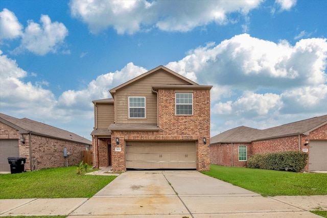 view of property featuring a garage and a front yard