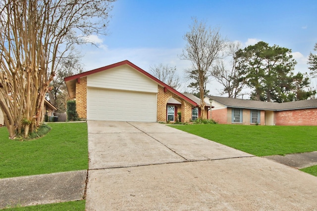 single story home with a garage and a front lawn