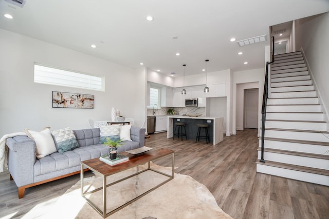 living room featuring light hardwood / wood-style flooring