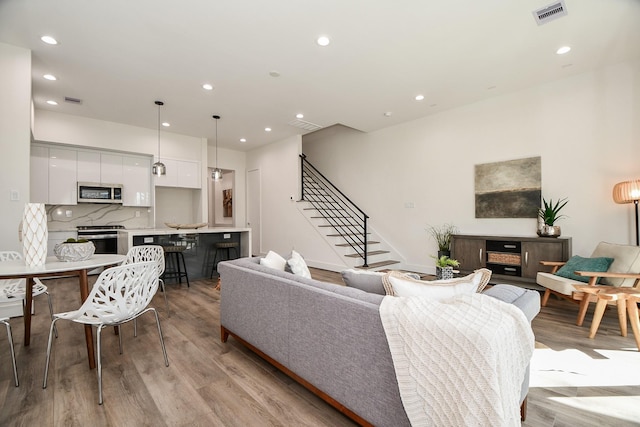 living room featuring light wood-type flooring