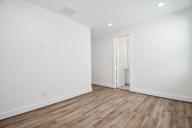 empty room with light wood-type flooring