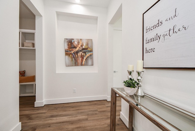 corridor featuring hardwood / wood-style flooring