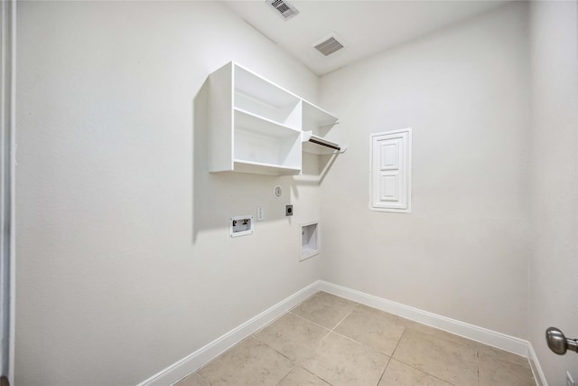 clothes washing area featuring washer hookup, light tile patterned floors, hookup for an electric dryer, and hookup for a gas dryer