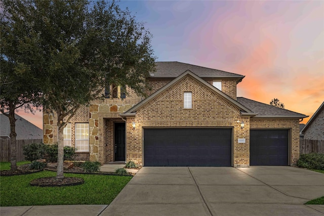 front of property with a garage