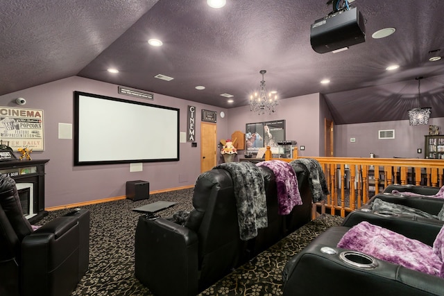 cinema room with carpet, lofted ceiling, a textured ceiling, and an inviting chandelier