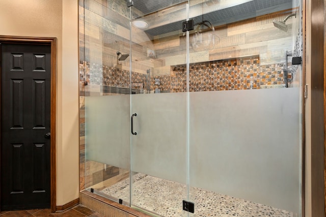 bathroom featuring an enclosed shower