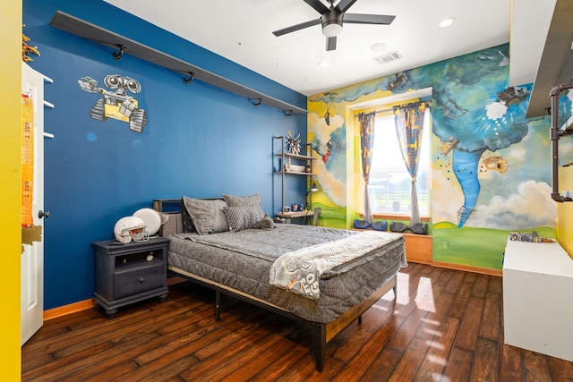 bedroom featuring dark hardwood / wood-style floors and ceiling fan