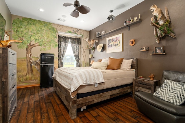 bedroom featuring ceiling fan and dark wood-type flooring