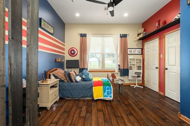 bedroom featuring dark hardwood / wood-style flooring and ceiling fan