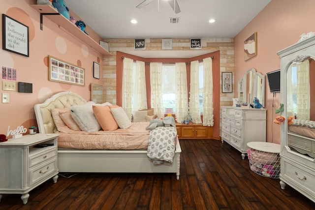 bedroom with ceiling fan and dark hardwood / wood-style floors