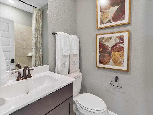 1412 River Point Dr, Friendswood, TX 77546 - bathroom featuring toilet, vanity, a shower with shower curtain, and a textured wall