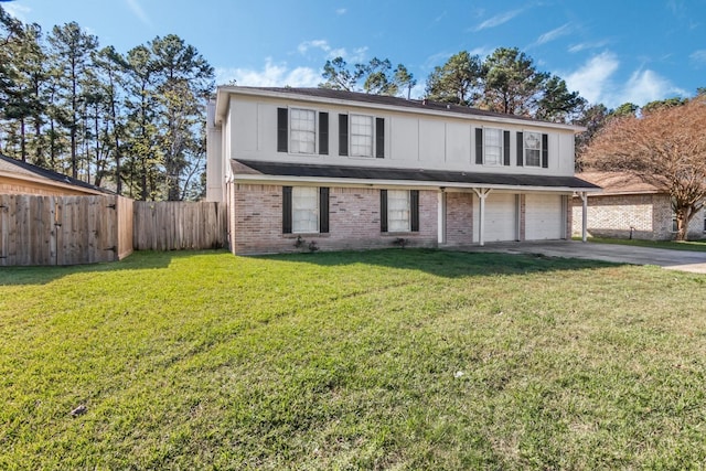 front of property with a front lawn and a garage