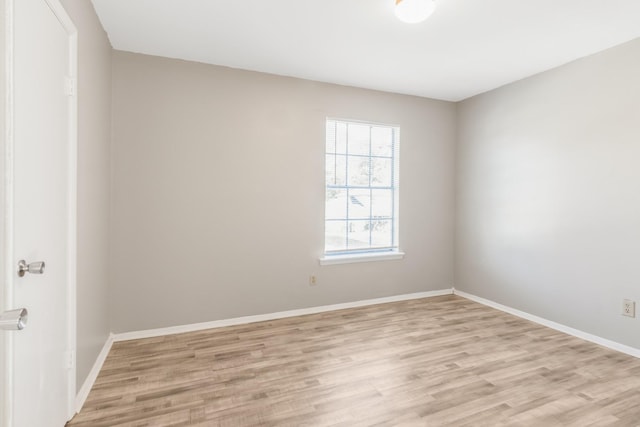 unfurnished room featuring light wood-type flooring