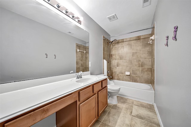 bathroom featuring visible vents, shower / bathing tub combination, vanity, and toilet