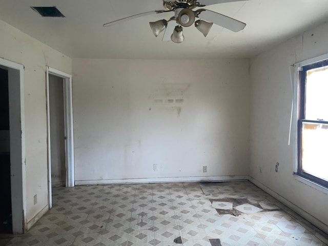 empty room featuring ceiling fan