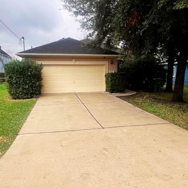 view of front of property with an outbuilding and a garage