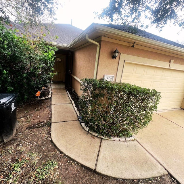 property entrance featuring a garage