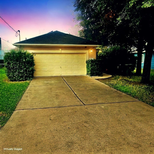 single story home with an outbuilding and a garage