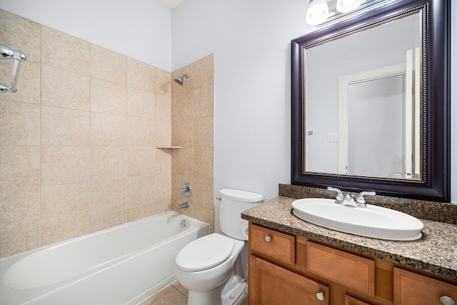 full bathroom featuring tile patterned floors, vanity, toilet, and tiled shower / bath combo