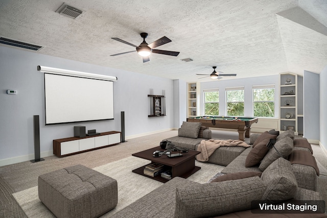 carpeted home theater featuring a textured ceiling, vaulted ceiling, ceiling fan, built in features, and billiards