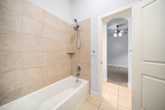 bathroom featuring tile patterned flooring, ceiling fan, and tiled shower / bath