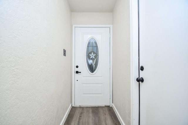 doorway to outside featuring hardwood / wood-style floors