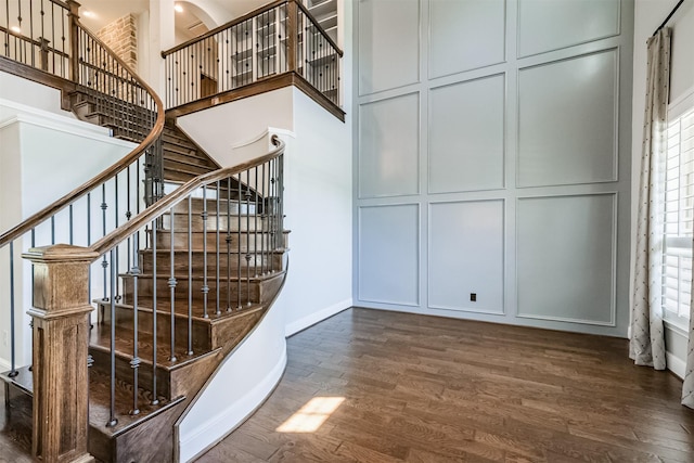 stairway featuring hardwood / wood-style floors