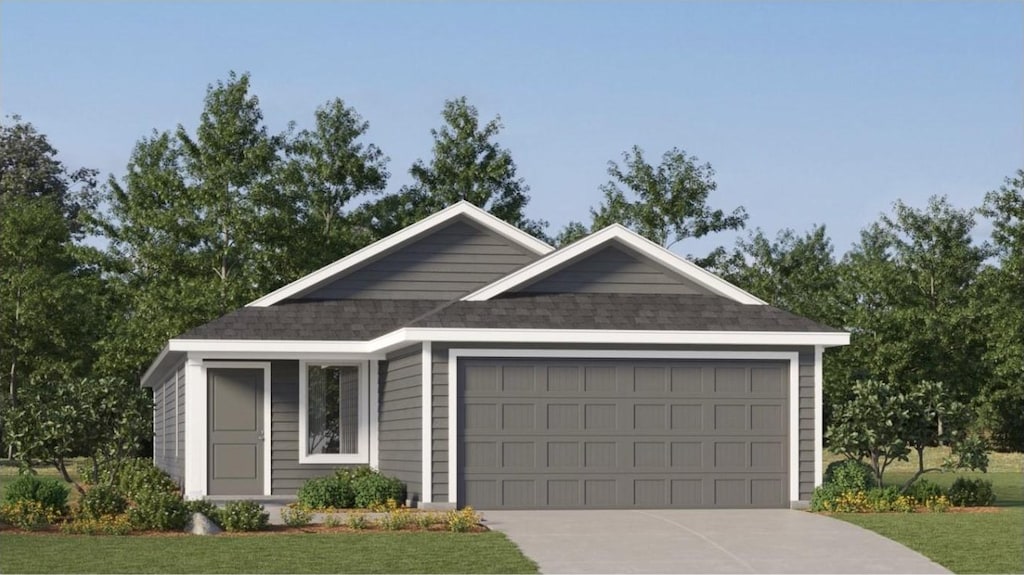 ranch-style home with a front yard and a garage