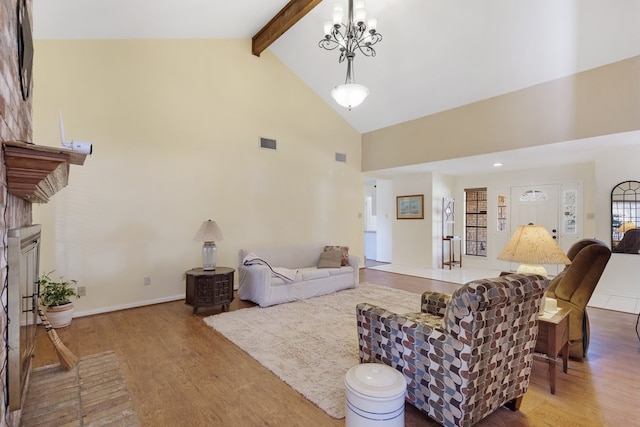 living room featuring beam ceiling, an inviting chandelier, high vaulted ceiling, and wood-type flooring