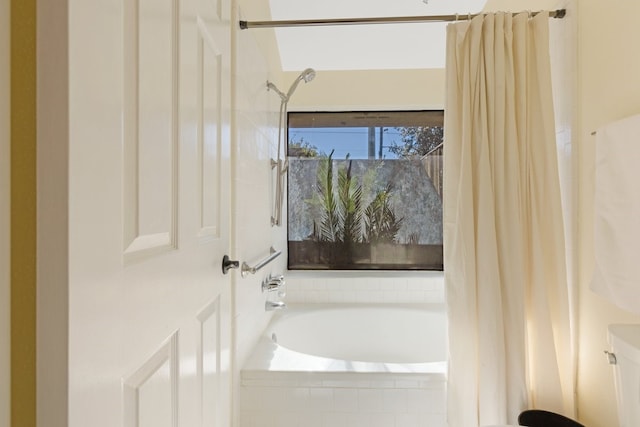 bathroom featuring shower / tub combo