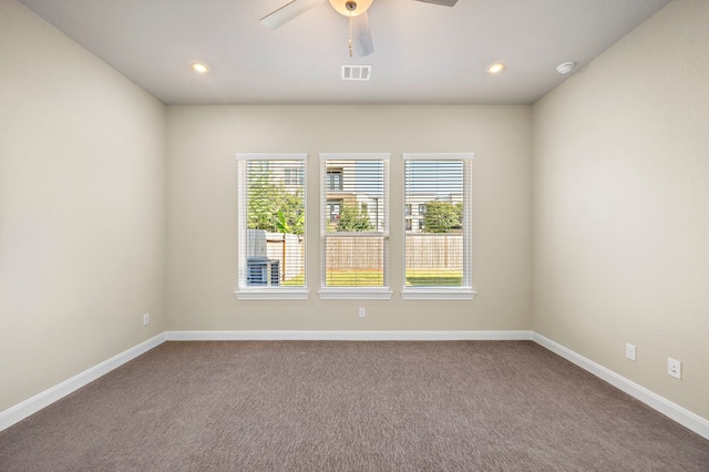 unfurnished room with carpet floors and ceiling fan