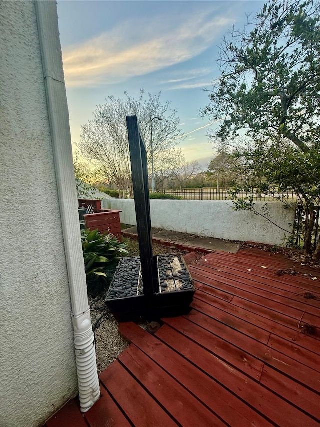 view of deck at dusk