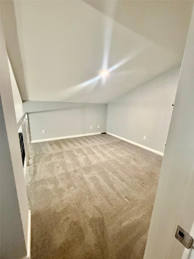 unfurnished living room featuring carpet flooring