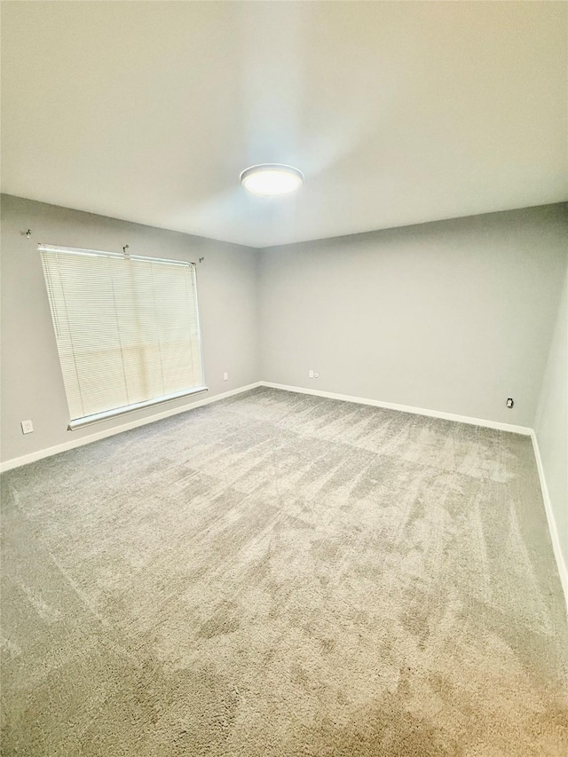 empty room with carpet floors