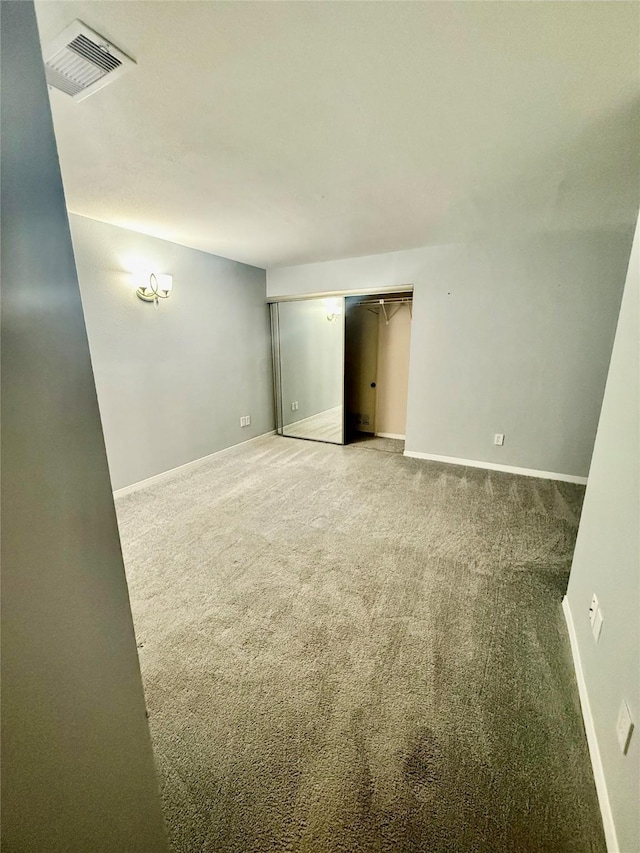 view of carpeted spare room