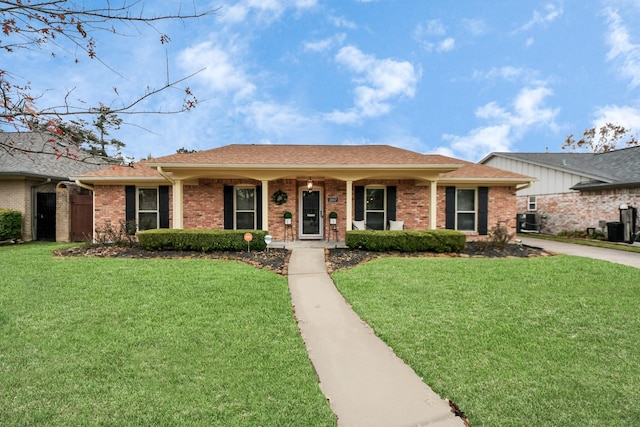 single story home featuring a front yard and a porch