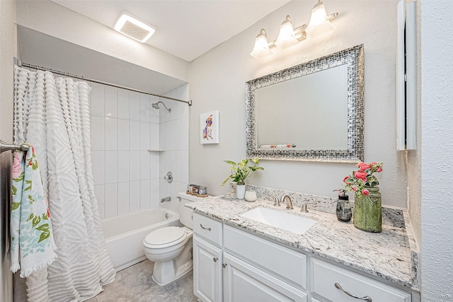 full bathroom featuring tile patterned flooring, vanity, toilet, and shower / bath combo with shower curtain