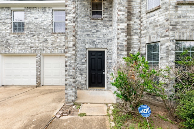 property entrance featuring a garage