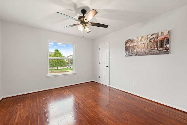 spare room featuring ceiling fan and wood-type flooring