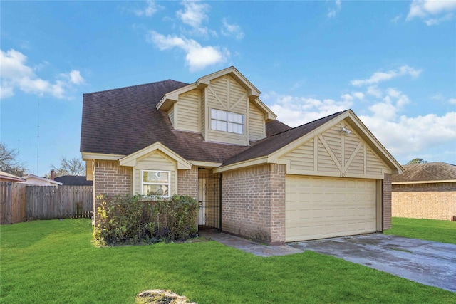 view of front of house featuring a front lawn and a garage