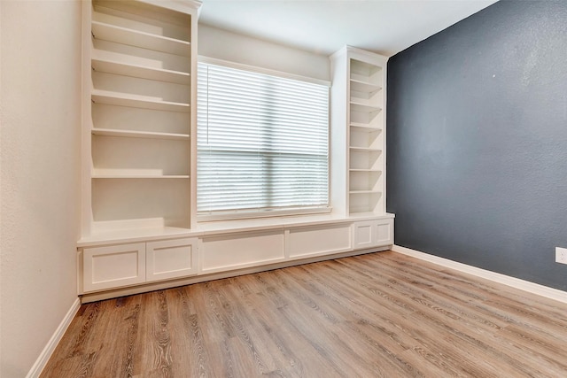 spare room featuring light hardwood / wood-style floors