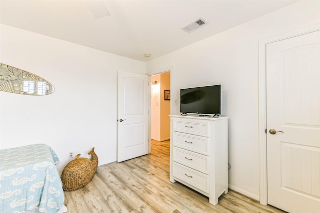 bedroom featuring light hardwood / wood-style flooring