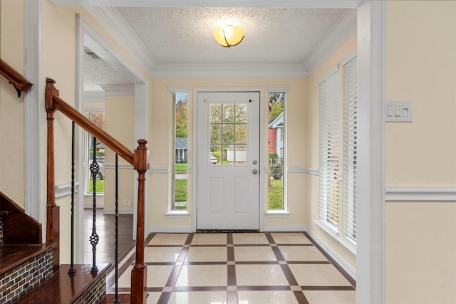 entrance foyer featuring a textured ceiling