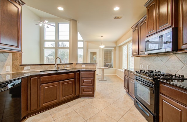 kitchen featuring tasteful backsplash, ceiling fan, sink, black appliances, and light tile patterned floors