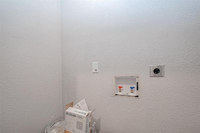 clothes washing area featuring washer hookup and electric dryer hookup