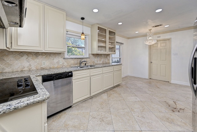 kitchen featuring pendant lighting, sink, backsplash, stainless steel dishwasher, and light stone counters