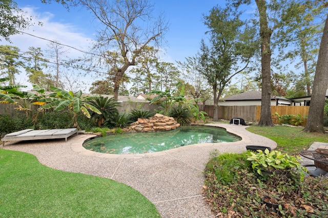 view of pool featuring a patio