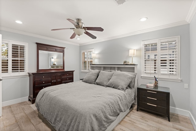 bedroom featuring ceiling fan, ornamental molding, and light hardwood / wood-style floors