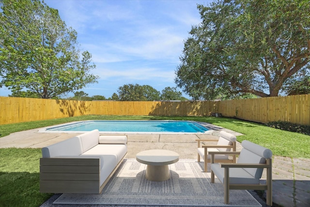 view of swimming pool featuring an outdoor living space and a patio