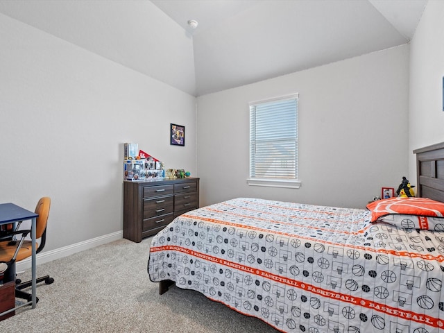 bedroom featuring lofted ceiling, carpet flooring, and baseboards